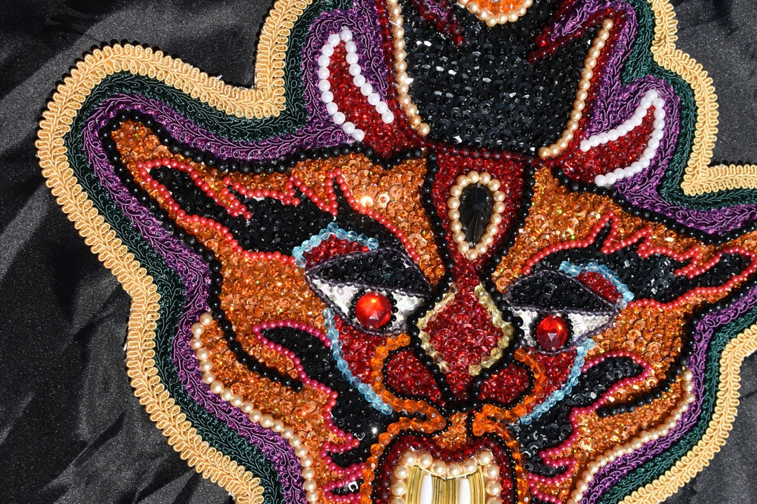 demon face made of beads